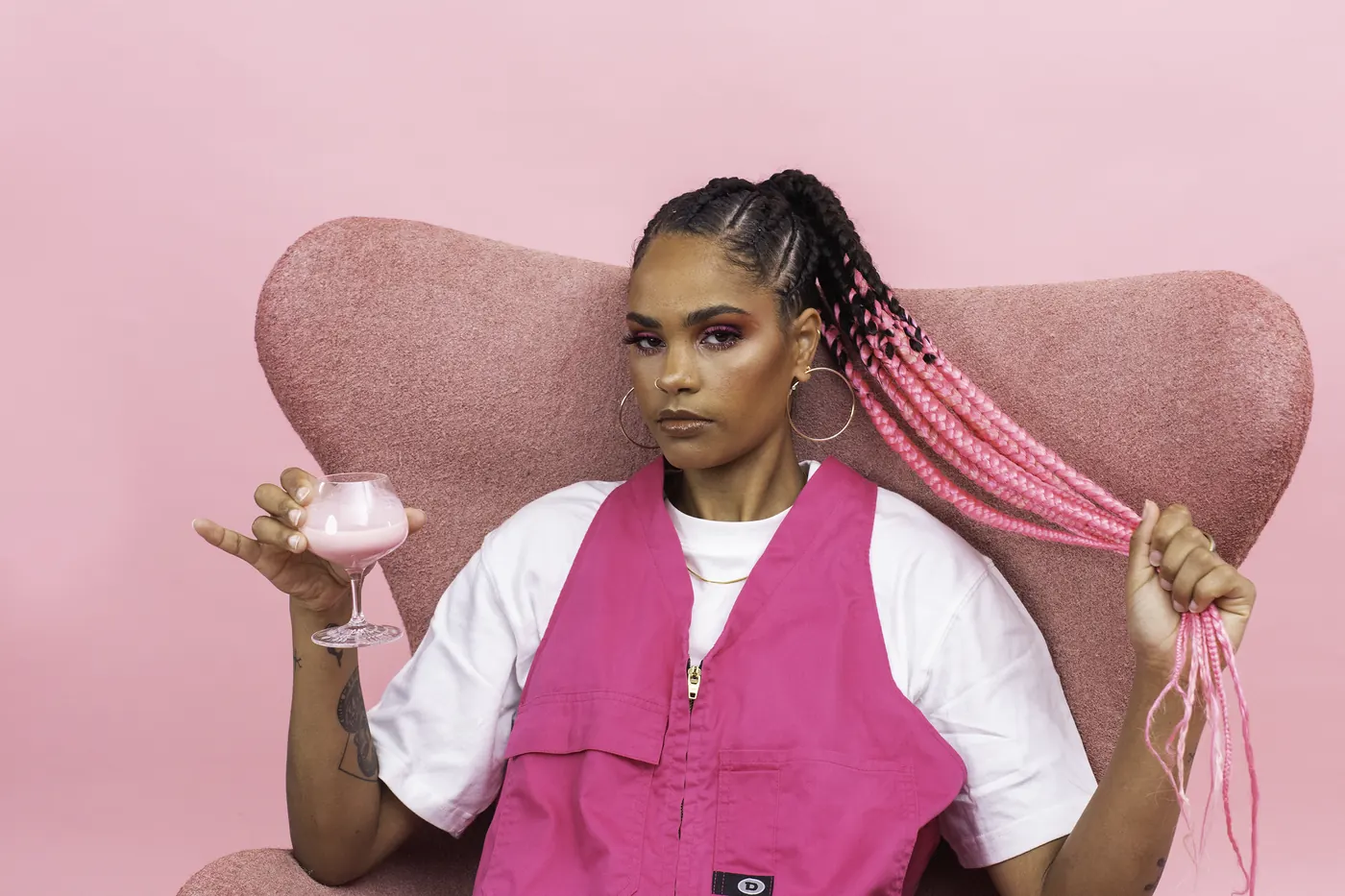 Jess B in a pink chair
